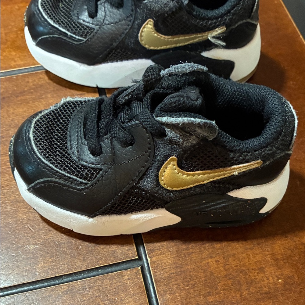 Nike Kids Black and Gold Sneakers